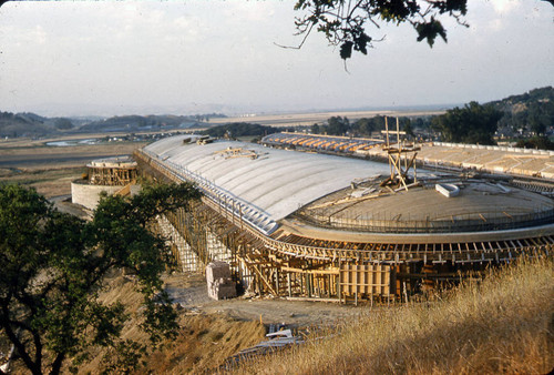 Administration Building under construction, circa 1960, at the Frank Lloyd Wright-designed Marin County Civic Center, San Rafael, California [photograph]