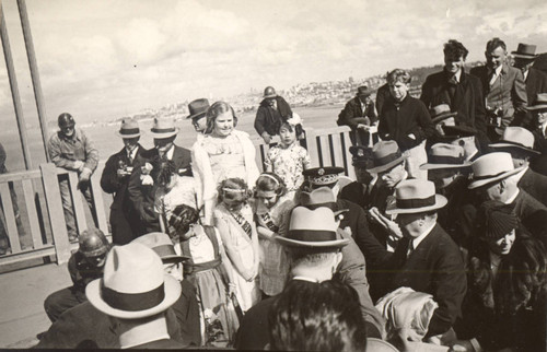 A crowd of invited guests celebrate the completion of the Golden Gate Bridge at the "Last Rivet" Ceremony, April 27, 1937[photograph]