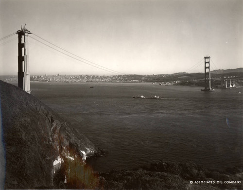 Towers of the Golden Gate Bridge, constructed 4,200 feet apart, and linked by ropes to support catwalks, September, 1935 [photograph]