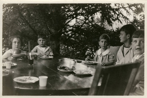 Children eating lunch at the annual Grape Festival at the Kent Family home, circa 1921 [photograph]