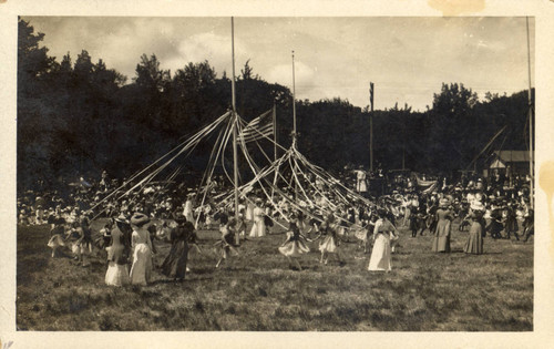 School children wrap may poles during the second annual May Day celebrations in Kentfield, California, May, 1910 [photograph]