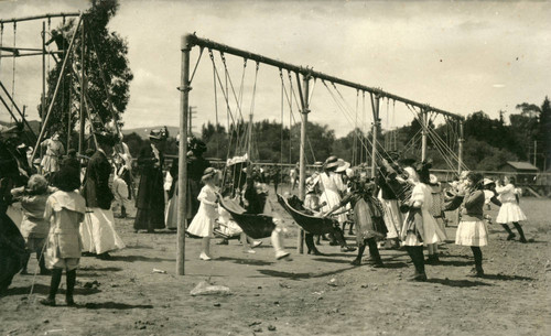 Children at the playground, Kentfield May Day Celebration, circa 1911 [photographic postcard]