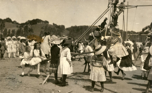 Children at the playground, Kentfield May Day Celebration, circa 1911 [photographic postcard]