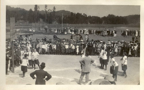 Girls play a game of basketball during the second annual May Day celebrations in Kentfield, California, May, 1910 [photograph]