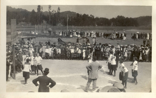 Girls play a game of basketball during the second annual May Day celebrations in Kentfield, California, May, 1910 [photograph]