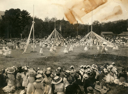 Corte Madera schoolchildren dancing around the may pole, Kentfield May Day Celebration, 1909 [photograph]