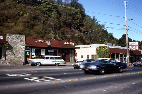 Village Peddler Bicycle store, and Barber Shop, on Magnolia Avenue, Larkspur, 1976 [photograph]