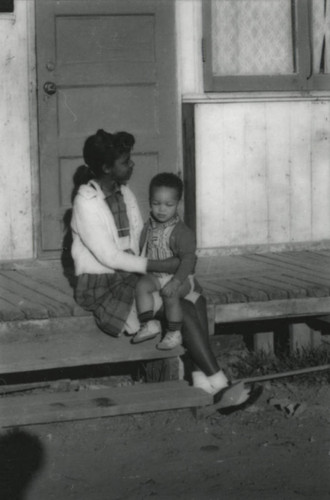 Children in front of World War II-era housing in Marin City, California, circa 1960 [photograph]