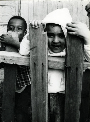 Children in front of World War II-era housing in Marin City, California, circa 1960 [photograph]