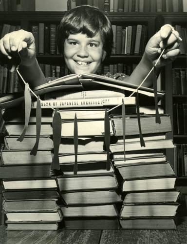 Joelle Cabella of Kentfield, California, participant in the summer reading program at the Kentfield-Ross Branch of the Marin County Free Library, August, 1958 [photograph]