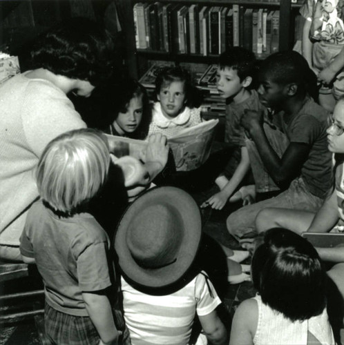 Storyteller Barbara Rauhala reads to children at the Fairfax Branch of the Marin County Free Library, August 21, 1964 [photograph]