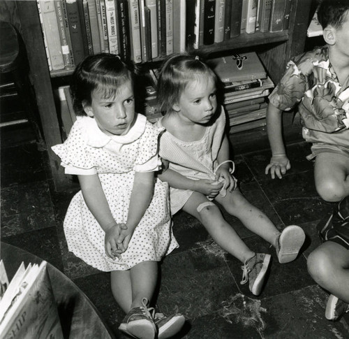 Children listening to stories at the Fairfax Branch of the Marin County Free Library, August 21, 1964 [photograph]