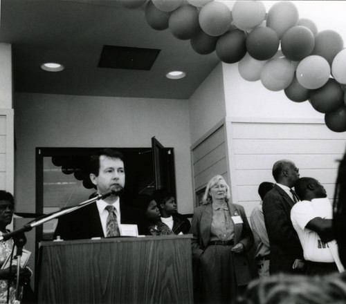 Acting Assistant County Librarian Joseph Murphy, speaking at the grand opening and dedication of the Marin City Branch of the Marin County Free Library, February 16, 1997 [photograph]