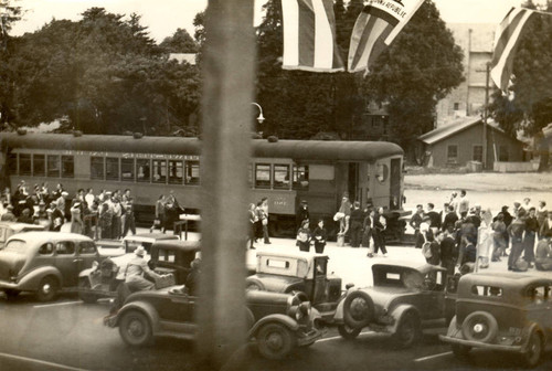 Passengers arrive at Mill Valley via the Northwestern Pacific Railroad, and prepare for the six-mile hike to the Mountain Theater, site of the Mountain Play, atop Mount Tamalpais [photograph]