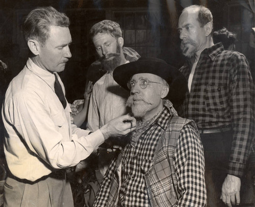 Actors getting their final touches of make-up before the 1958 Mountain Play, Rough an' Ready, on Mount Tamalpais [photograph]