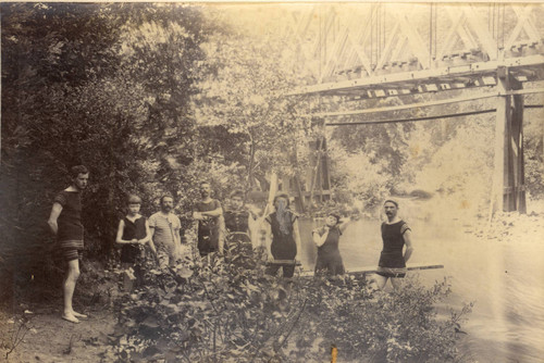 Bathers at Paper Mill Creek (Laguinitas Creek), Taylorville, with Irving Railroad Bridge in background, Marin County, California, 1889 [photograph]