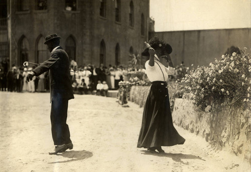 Prisoners (including female impersonator on right) from San Quentin State Prison provided entertainment to the public on Sunday mornings, Marin County, California, 1914 [photograph]