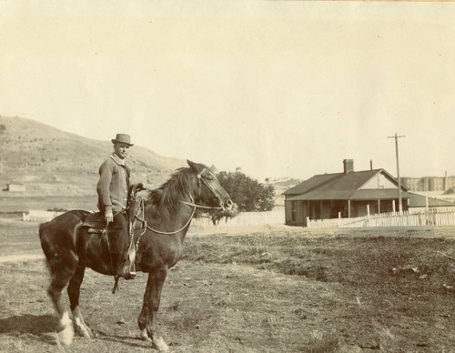 Prison guard on his horse near San Quentin State Prison, circa 1913 [photograph]