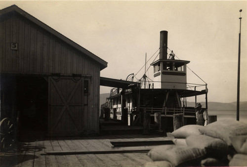 The paddlewheel steamer Caroline at the San Quentin State Prison dock, circa 1915 [photograph]