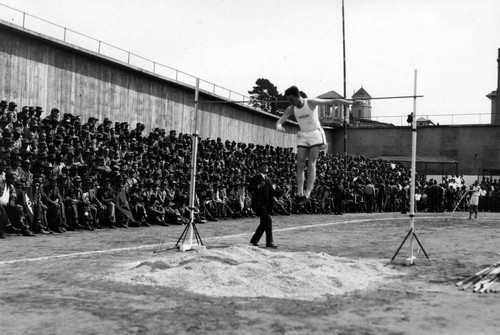 Pole vault competition, San Quentin Little Olympics Field Meet, 1930 [photograph]