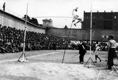 Pole vault competition, San Quentin Little Olympics Field Meet, 1930 [photograph]