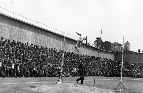 Pole vault competition, San Quentin Little Olympics Field Meet, 1930 [photograph]