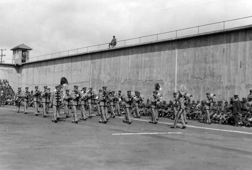 Marching band parading before spectators, San Quentin Little Olympics Field Meet, 1930 [photograph]