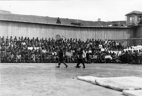 Stage entertainment featuring two clowns, San Quentin Little Olympics Field Meet, 1930 [photograph]
