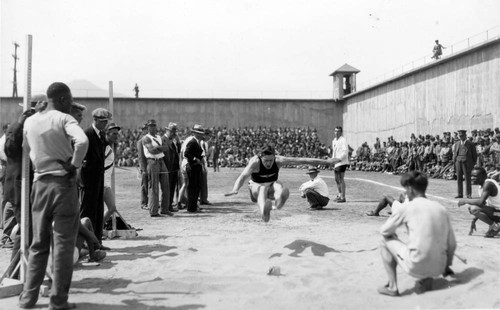 Long-jump competition, San Quentin Little Olympics Field Meet, 1930 [photograph]