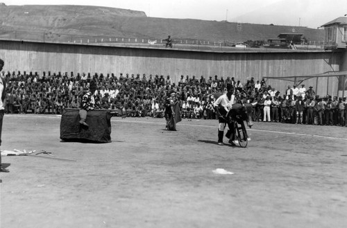 Stage entertainment depicting a mock bullfight, San Quentin Little Olympics Field Meet, 1930 [photograph]