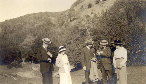 Group walking in the Black Canyon area of San Rafael, California, March 1914. [photograph]