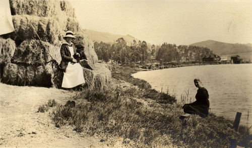 Two women relaxing beside the San Rafael Canal, San Rafael, California, September 1913 [photograph]