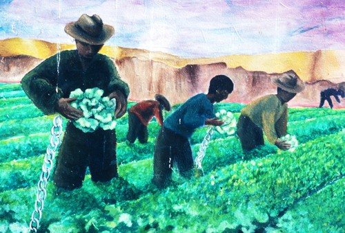 Chicano Park: Death of a Farmworker: detail of chained farmworkers picking lettuce