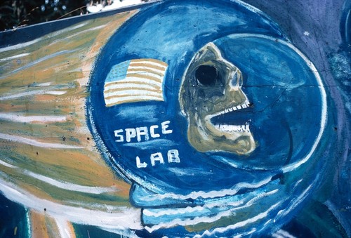 Chicano Park: Historical Mural: detail of skull inside a space helmet