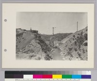Pardee Dam, Construction View,--General view, showing upstream face of dam, contractor's mixing plant, cable ways, towers, and pouring chutes
