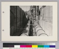 Pardee Dam, Construction View,--Show penstocks for the two units of the power plants placed in lower portion of dam. These penstocks are 72 inches in diameter. The combined flow that can be passed through the 2 penstocks and the four sluice pipes, when the reservoir is full, is 6,000 cu. ft. per sec