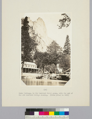 Cedar Cottage, in the Sentinel Hotel group, with the end of the old Sentinel Bridge showing. (Taken prior to 1880)