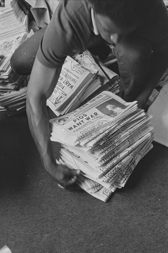 Getting the Black Panther newspaper ready for national distribution, Black Panther National headquarters, Berkeley, CA, #104 from A Photographic Essay on The Black Panthers