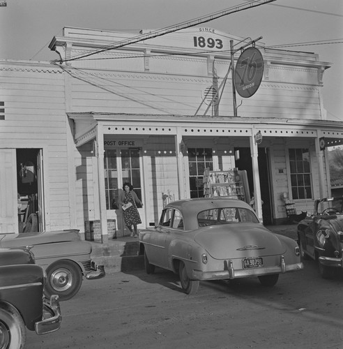 McKenzie storefront and autos, Monticello, Berryessa Valley