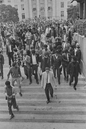 After rally at University of California campus, Eldridge and Kathleen Cleaver leave, Berkeley, CA, #115 from A Photographic Essay on The Black Panthers