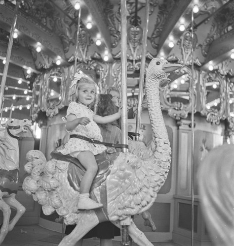 Child on ostrich, from Carousel, San Francisco Zoo