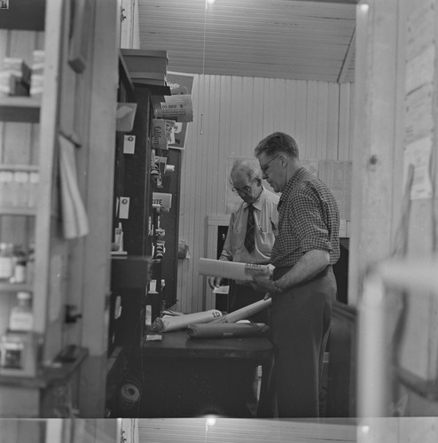 McKenzie senior and son inside their store, Monticello, Berryessa Valley