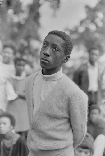 Young man, Free Huey Rally, Bobby Hutton Memorial Park, Oakland, CA, #93 from A Photographic Essay on The Black Panthers