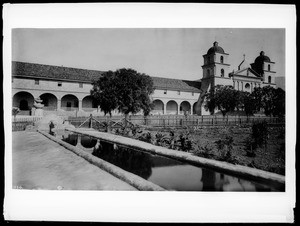 Mission Santa Barbara, California, showing water in Indian wash place, ca.1885