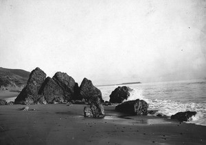 View of the Castle Rock formation with the Mile-Long Pier visible in the background, 1899-1911