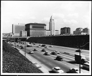 View looking southwest at the Los Angeles Civic Center, showing the Hollywood Freeway in the foreground, ca.1953