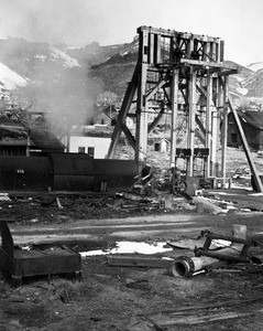 View of the Consolidated Virginia Mineshaft in Virginia City, Nevada, showing hills in the background, ca.1935