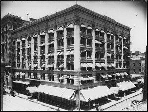 Exterior view of the Van Nuys Hotel on the corner of Main Street and Fourth Street in Los Angeles, 1900-1909