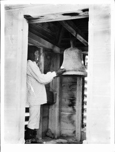 The bell ringer with his bell at the pueblo of Isleta, New Mexico, ca.1898