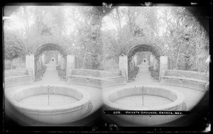 Empty stone fountain in a large private garden, Oaxaca, Mexico, ca.1900